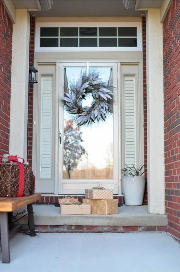 Outside view of a front door with wrapped packages on the doorstep